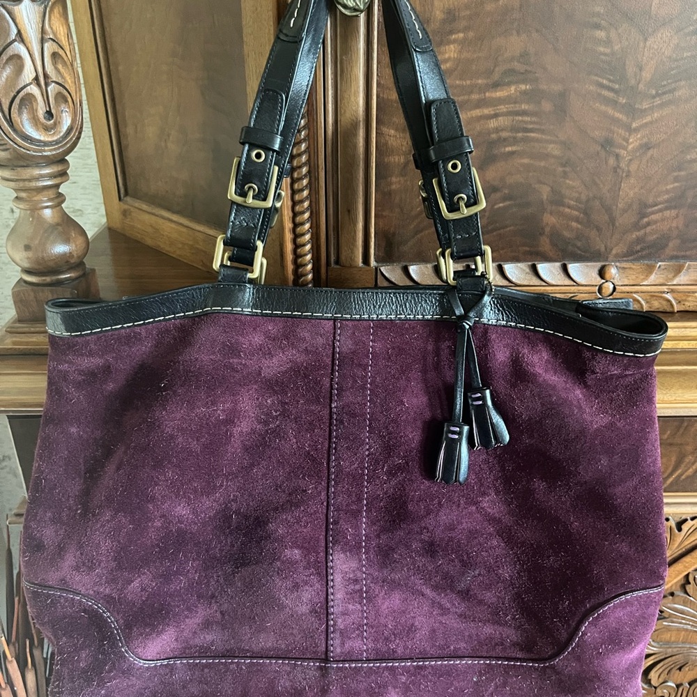Burgundy/purple colored two handled tote bag/large purse by Coach